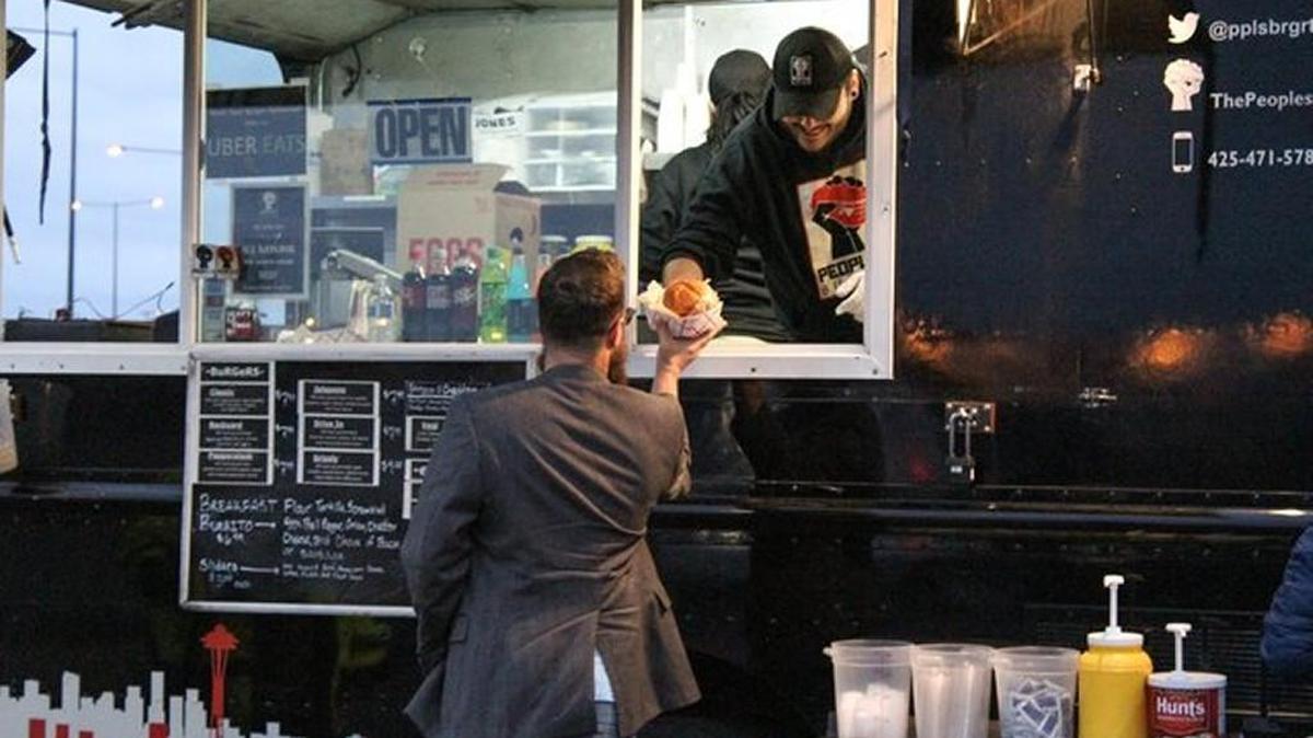 The People’s Burger, owned by Farshid Varamioni, was one of the food trucks that participated in a pilot program at the Seattle-Tacoma International Airport’s cellphone waiting lot. The city of SeaTac shut down the program after two weeks.