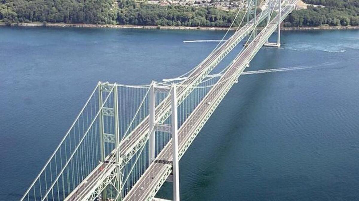 The old and new Tacoma Narrows Bridges together shortly after their opening from a Cessna 172SP airplane.