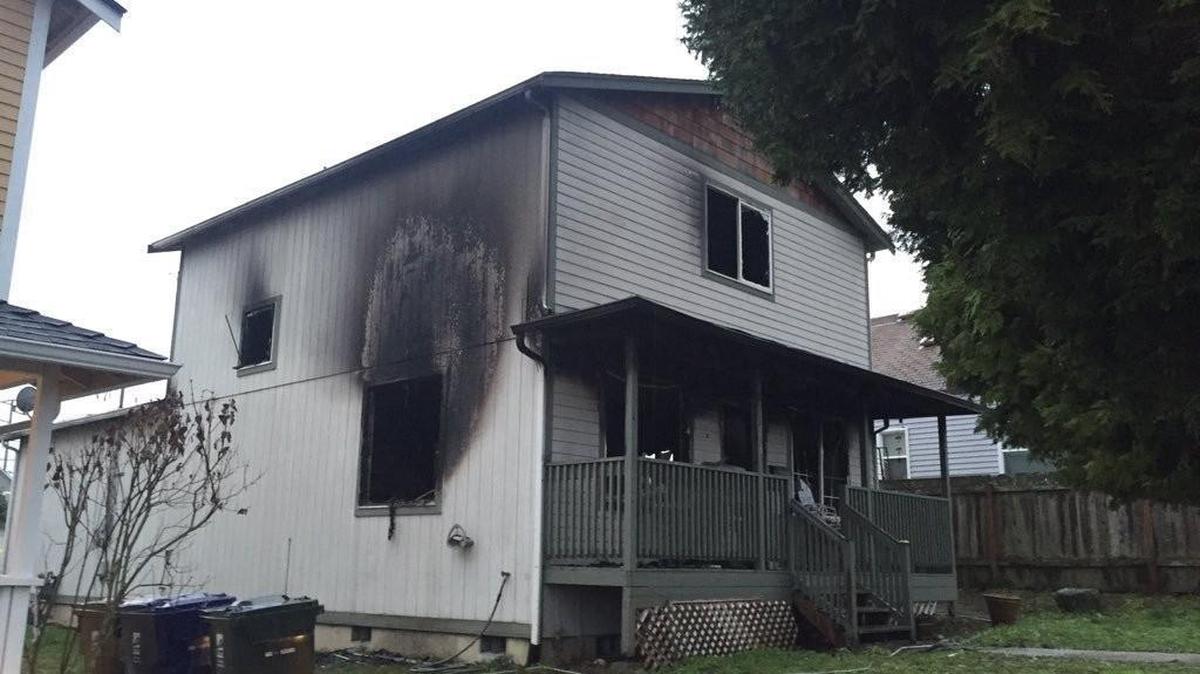A woman died early Saturday in a house fire in the 1300 block of East Harrison Street in Tacoma.