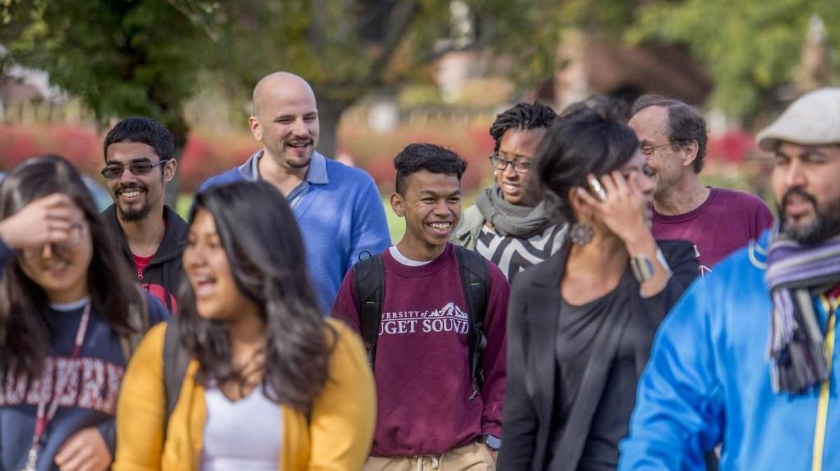 University of Puget Sound student Thavy Thach walks with a group of Access Scholars and administrators to a meeting on campus Oct. 21.