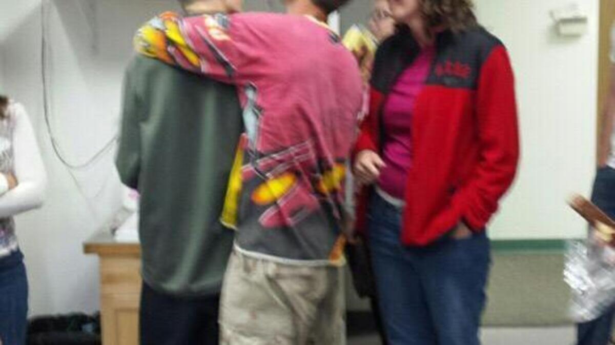 
Sluyter reunites with his family.

