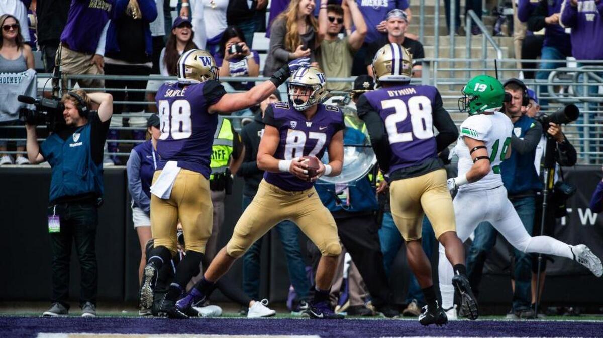 Washington tight end Cade Otton (87) reacts after his touchdown in the third quarter. The University of Washington played North Dakota in a NCAA football game at Husky Stadium in Seattle, Wash., on Saturday, Sept. 8, 2018.