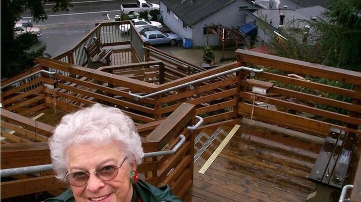 Former Gig Harbor Mayor Gretchen Wilbert, shown in 2000, stands at the top of the Finholm View climb, one of the projects she helped get built.