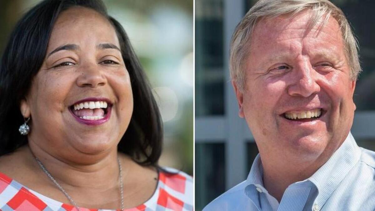 Tacoma mayoral candidate Jim Merritt, right, appeared to concede the race to Victoria Woodards on Thursday. Woodards’ Election Night lead had grown with each subsequent vote tally.