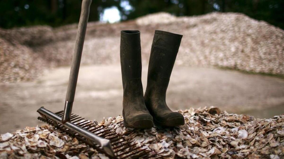 These are the boots and shellfish rake of Andres Hernandez. He had been working in Pacific County for nearly two decades before he was picked up by immigration agents.