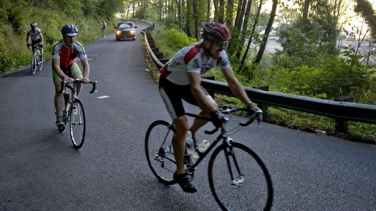 Members of the Lahar Bicycle Club and Bonney Lake Bike Team climb out of the Auburn valley toward Edgewood on Aug. 26, 2011. We’re sure they were biking sober, but a state trooper tells traffic columnist Candice Ruud you could be cited for DUI if you operate your bike drunk or high.