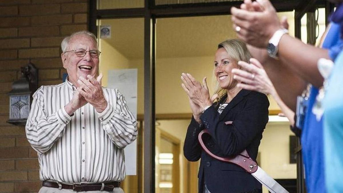 Sumner Mayor Dave Enslow, left, and Superintendent Laurie Dent applaud after the ribbon-cutting ceremony of the new Elhi Hill High School building in Sumner on Oct. 3, 2016. Enslow is retiring in January after a long career serving the city of Sumner.