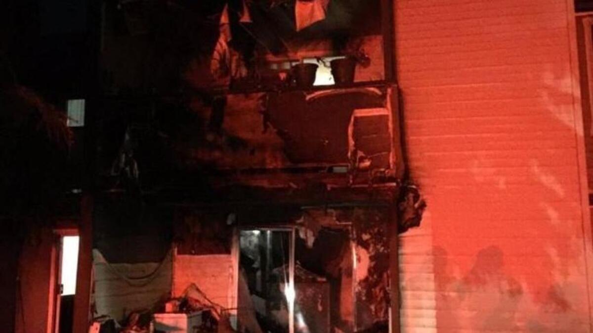 A father broke a window and pulled his children safety as fire burned their Federal Way apartment on Wednesday morning.