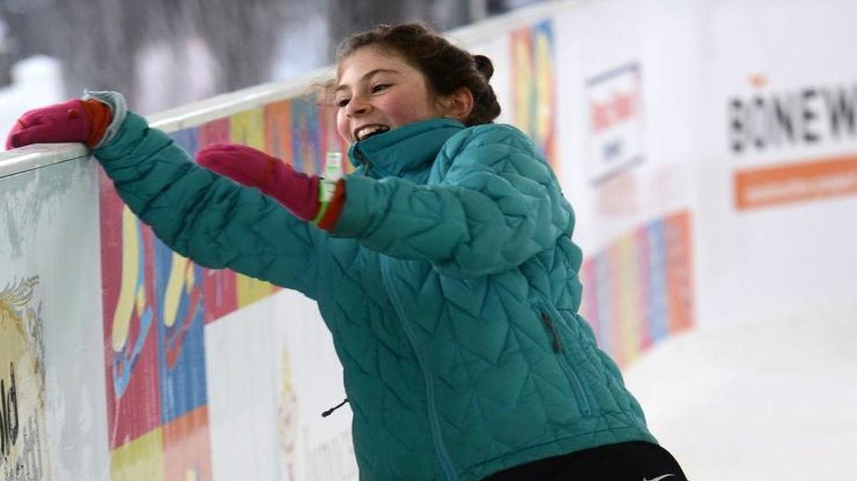 Serafina Hallie, 10, of Tacoma uses the ice rink to maintain her balance while ice skating at Tollefson Plaza ice rink in 2012.