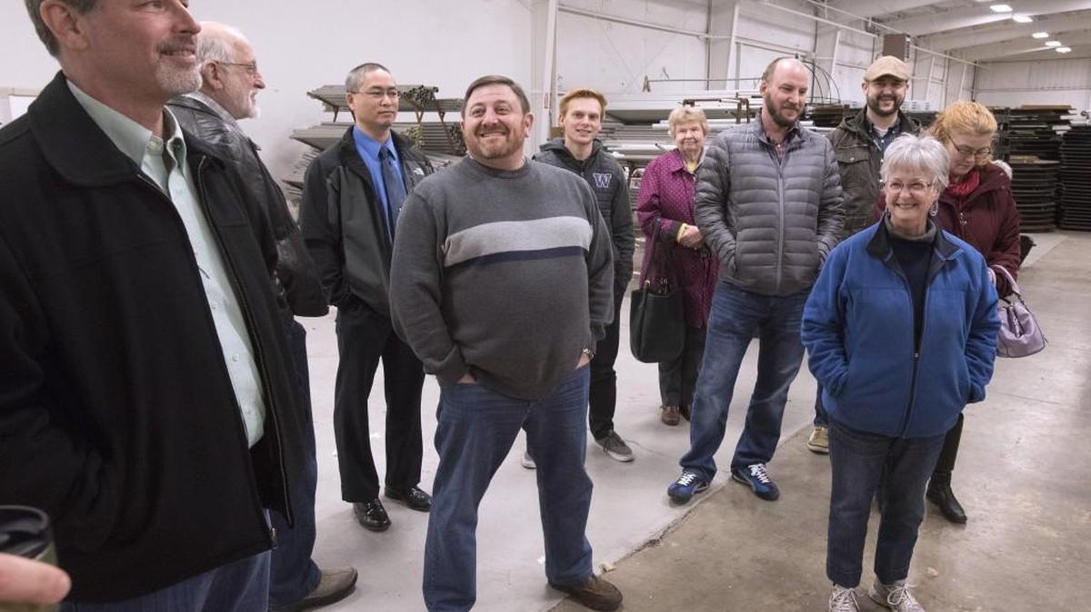 Lacey City Council members Jeff Gadman, front left; Lenny Greenstein,center, and deputy mayor Cynthia Pratt gather with others for a meeting of the Lacey City Council in the empty building that will house the new Lacey History Museum on Thursday, Feb. 2, 2017.