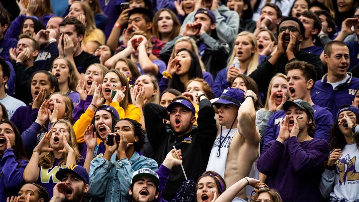 Fans cheer during the game. The University of Washington Huskies played Brigham Young University in a NCAA football game at Husky Stadium in Seattle, Wash., on Saturday, Sept. 29, 2018.