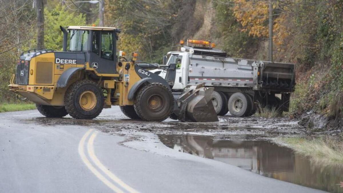 City of Tacoma crews clean up a small landslide on Marine View Drive in Tacoma on Nov. 1. The area is prone to slides, which create work and could be dangerous.
