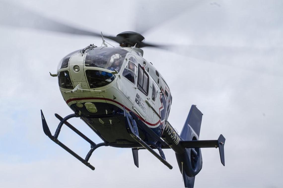 An Airlift Northwest helicopter takes off from the lawn during National Night Out at the Gig Harbor Civic Center.
