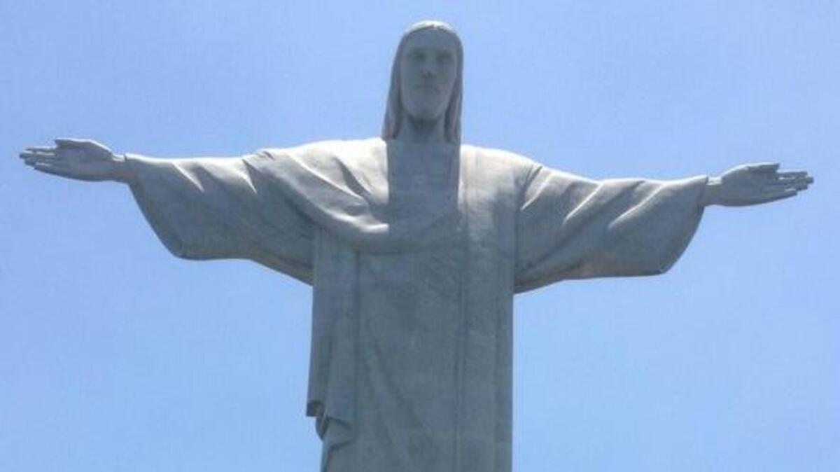 Christ the Redeemer (Cristo Redentor) statue on Corcovado mountain in the Tijuca Forest National Park overlooking the city of Rio de Janeiro, Brazil.