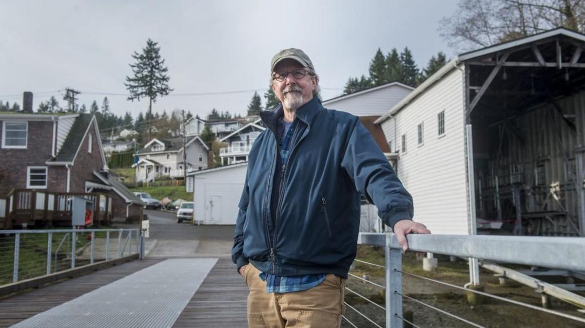 Guy Hoppen, the president of the Eddon BoatShop, stands for a portrait outside the boat shop in Gig HarborJan. 18.