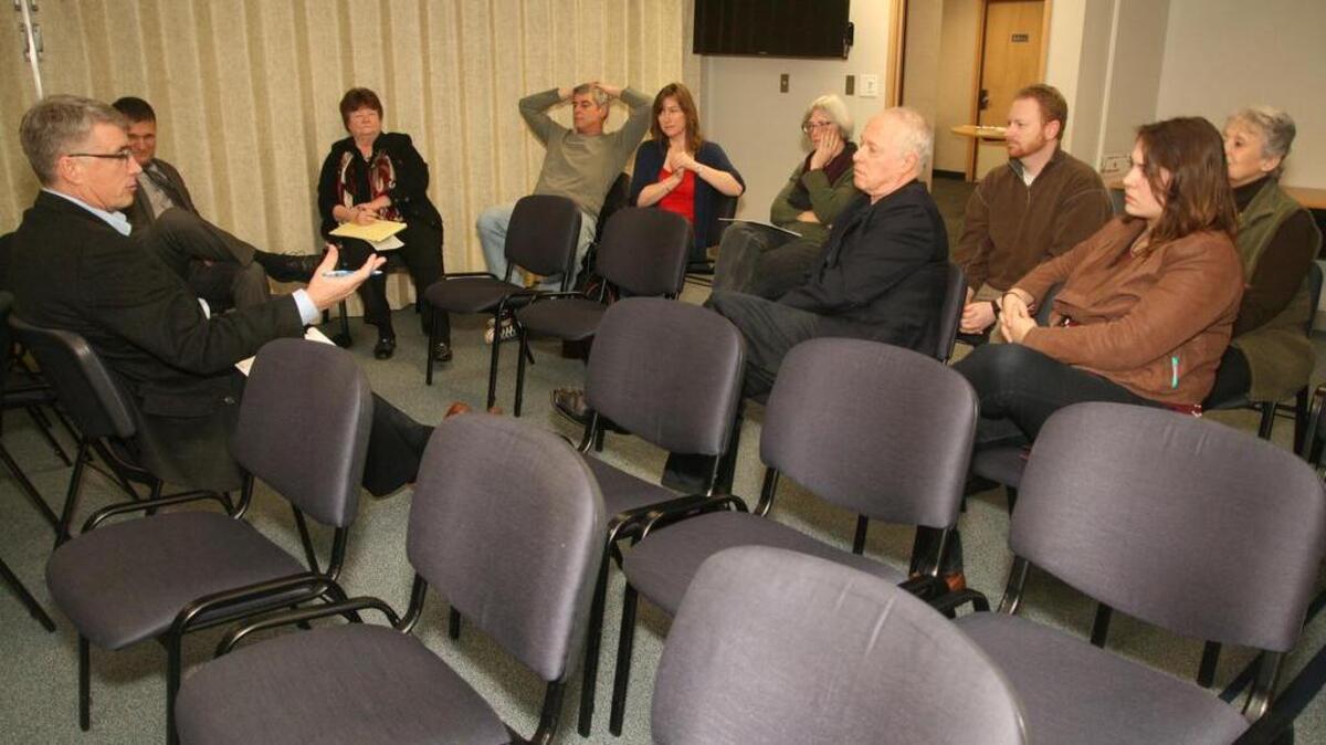 Mark J. Venn of Northwest Leadership Associates, left, gathers information from Key Peninsula citizens attending a Peninsula Schools Superintendent Search Focus Group on Monday in Purdy.