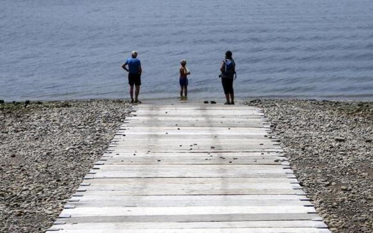 Visitors check out the new boat launch at Joemma Beach State Park on the Key Peninsula Monday afternoon.