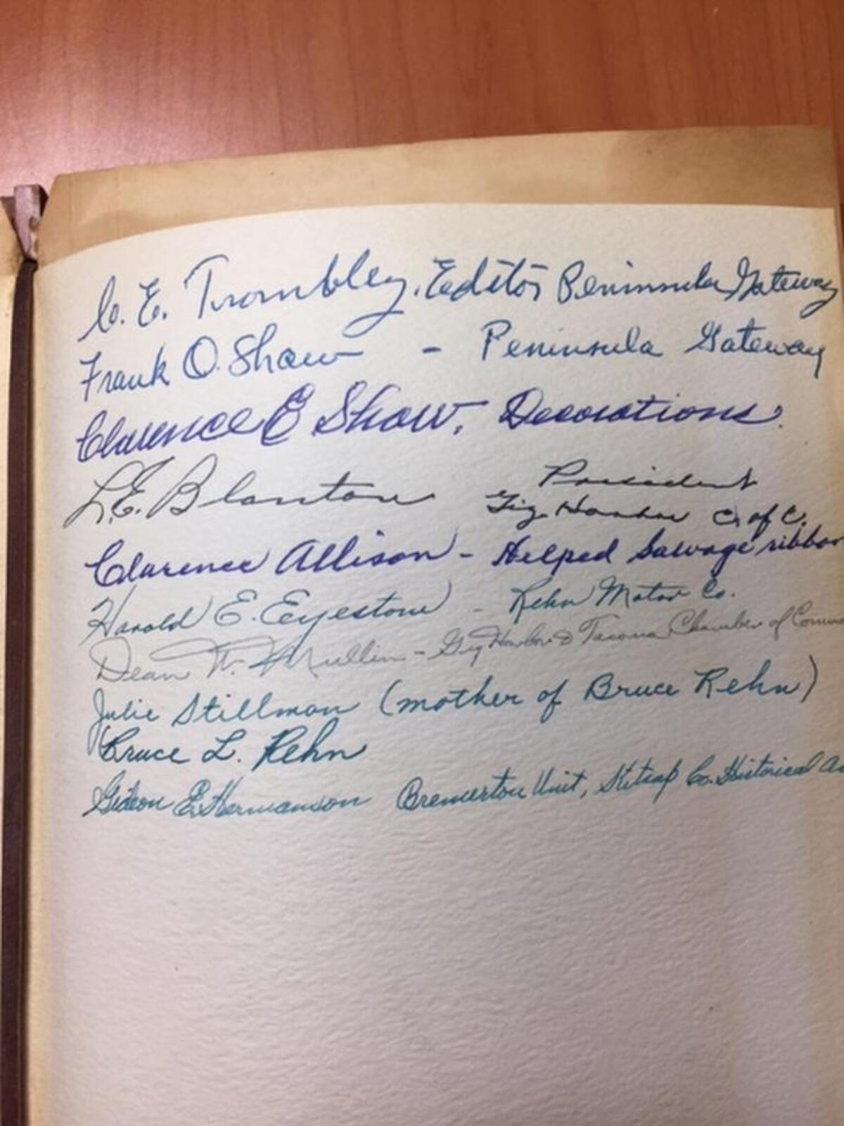 The book has a page signed by 10 people, two of which were associated with The Peninsula Gateway.