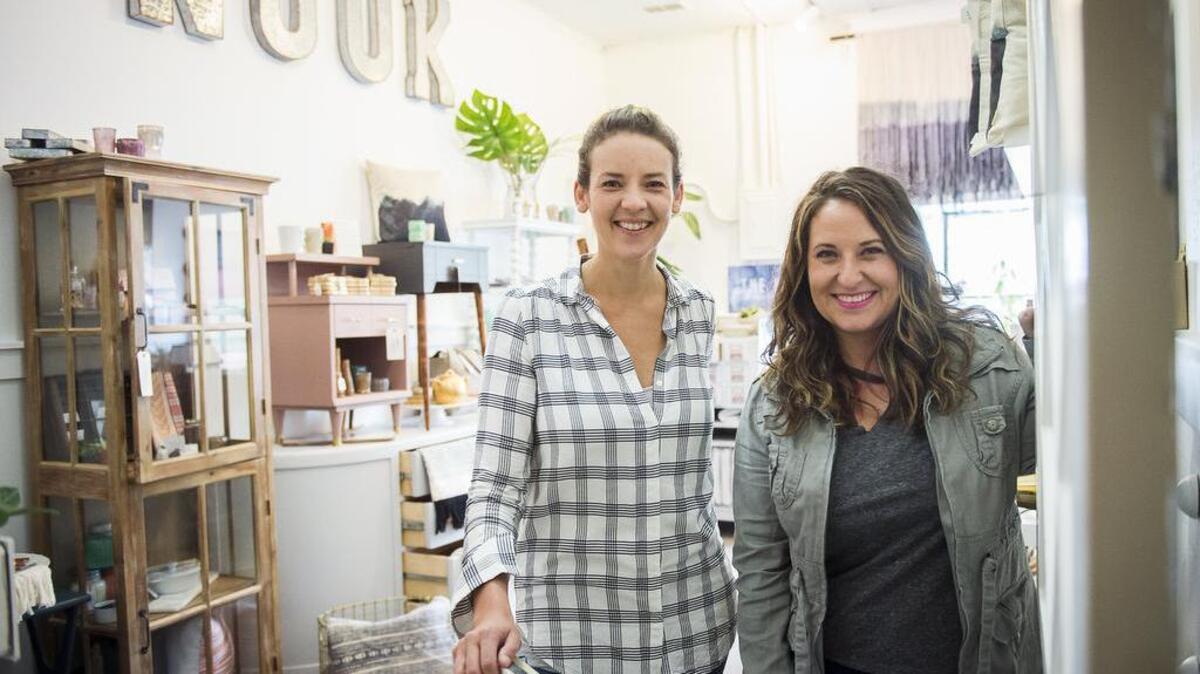 Linnea Bergstrom, left, and Stephanie Hammel are the owners of The Nook in Gig Harbor. The store features a variety of items including furniture, handcrafted bags and jewelry.