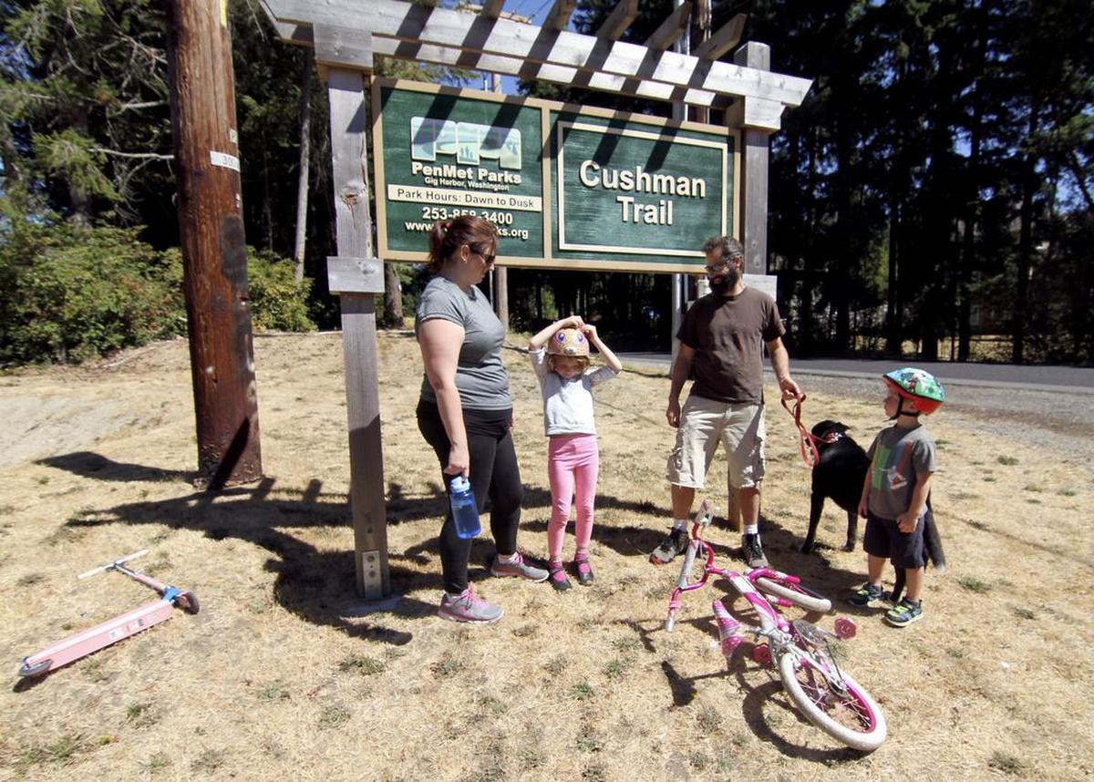 The Russell family of Gig Harbor assemble at the Cushman Trailhead before getting a walk and ride in. (File photo)