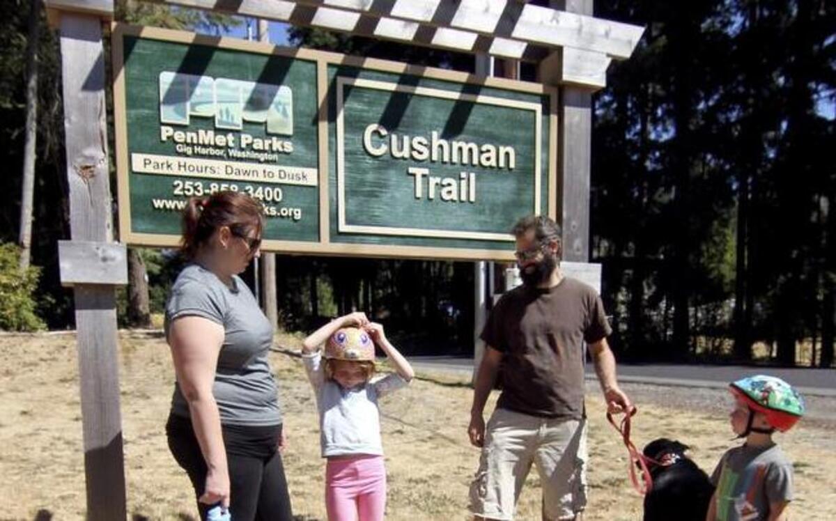 
The Russell family of Gig Harbor assemble at the Cushman Trailhead before getting a walk and ride in last Thursday.

