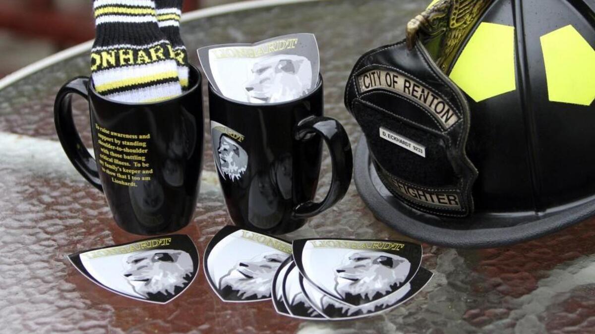 
Lionhardt mugs, stickers and Donovan Eckhardt’s Renton Fire Department helmet help keep his legacy alive and at the forefront at Mike Bain’s Port Orchard home.
