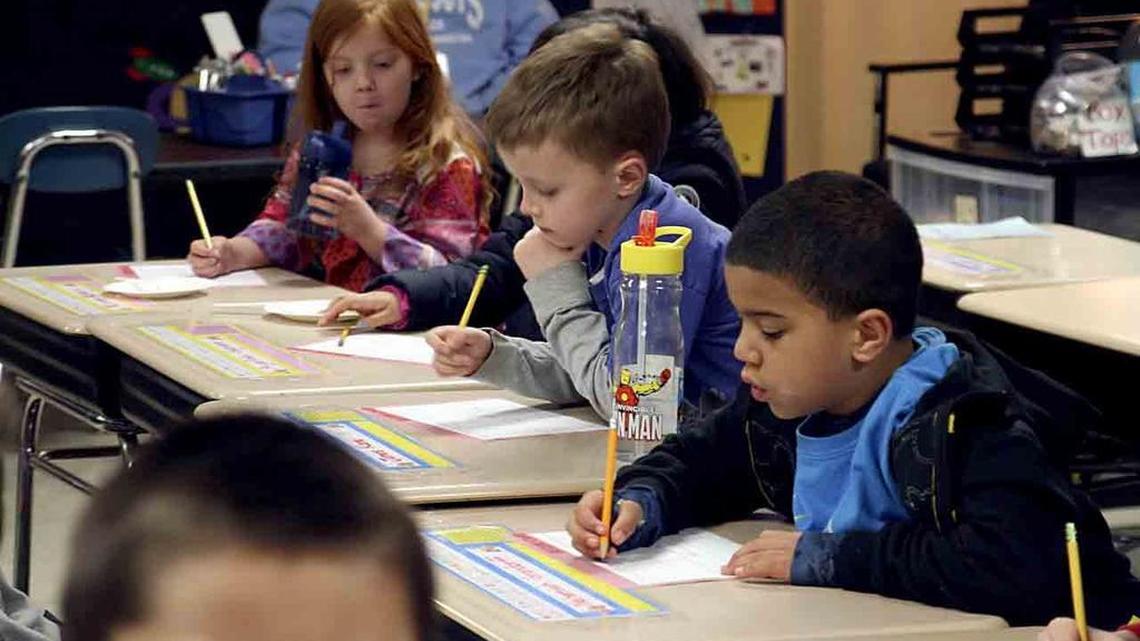 Minter Creek Elementary first-graders Kameron Kilner, Angelina Segrera, James Kane, and Nehemiah Grandorff work on writing critiques. Minter Creek is one school in the Peninsula School District targeted for new upgrades if the $220-million bond measure passed in April. On March 22, the Peninsula School District board of directors approved a $3-million budget extension to bring two portables to Minter Creek Elementary to help with overcrowding.