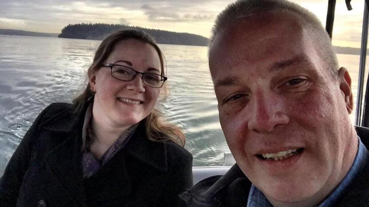 Peninsula Gateway reporter Andrea Haffly poses with former Gateway photographer Lee Giles III in December 2015 aboard the “On Time” while writing about On Time Tours, a Gig Harbor boating tour company owned by Gaylene and Ken McCray.