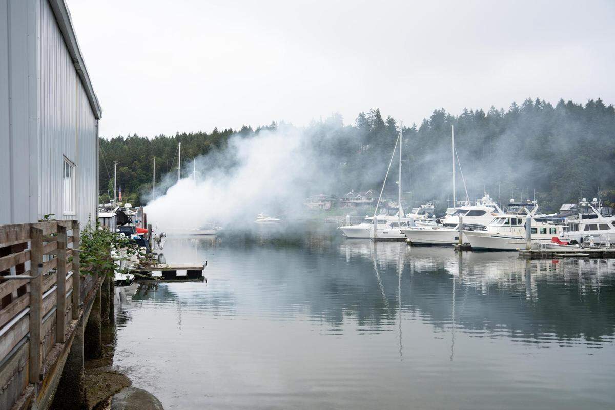 Gig Harbor Fire and Medic One gathered for their second training event at the Gig Harbor Marina in Gig Harbor, Wash. on Wednesday June 22, 2022. They brought in smoke machines to replicate fire as they create a real world scenario with multiple boats and victims.