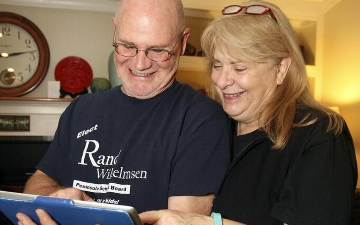 Rand and Penny Wilhelmsen are pleased with the incoming results of the Peninsula School Board election Nov. 3 at their home with friends.