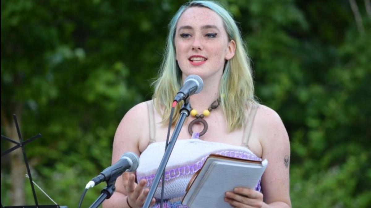 Malia Shaw, a Tacoma Community College student, performs a poem at the June 30 teen Open Mic Night hosted by PenMet Parks. Shaw will be the host of the music and poetry part of Sunday’s Take a Minute, Save a Life suicide prevention awareness event at Skansie Brothers Park.