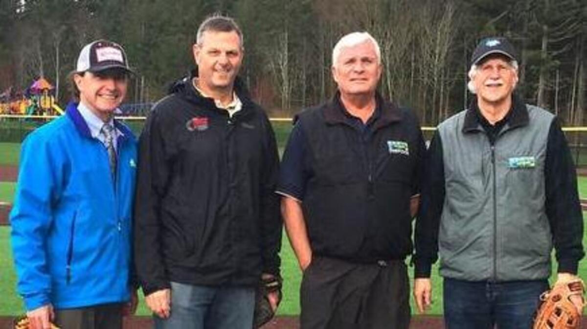 From left, Kurt Grimmer, Steve Nixon, Terry Lee and Eric Guenther of PenMet Parks were on hand in February 2017 at Sehmel Homestead Park to celebrate the new turf infields that were recently completed. Lee has announced he is retiring in May.