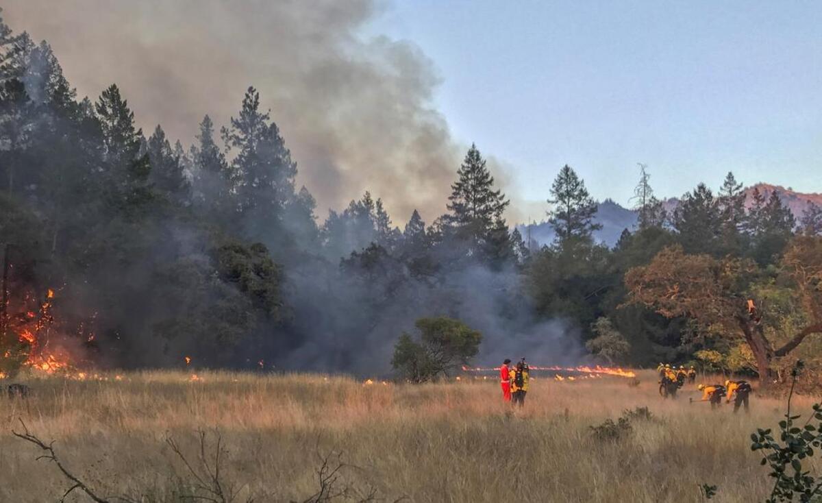 Led by Key Peninsula Firefighter Ken Foss, personnel from South Kitsap Fire, North Kitsap Fire & Key Peninsula construct handline on the Oakmont Fire.