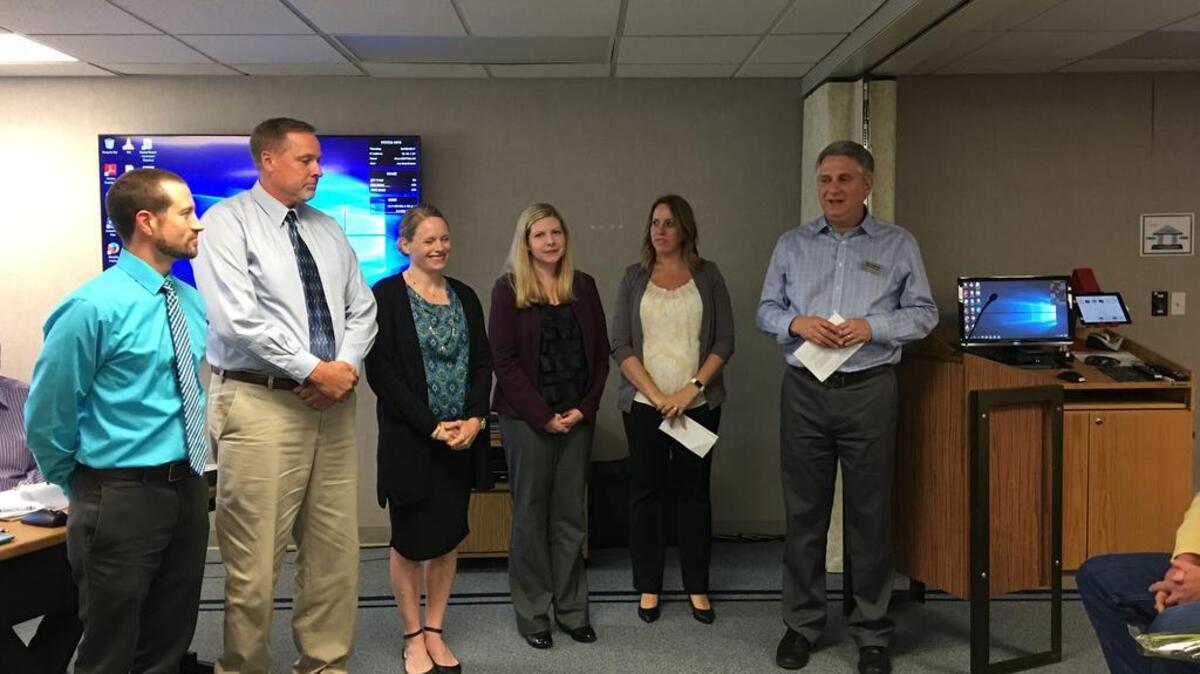 New administrators for the Peninsula School District are introduced by Assistant Superintendent of Elementary Programs John Hellwich, right, to the Board of Directors at the June 8 meeting. From left, David Bentler, Harbor Heights assistant principal; Todd Dempewolf, Voyager assistant principal; Lillian Page, Vaughn principal; Jessica Rosendahl, Artondale principal and Stephanie Strader, Harbor Heights principal.