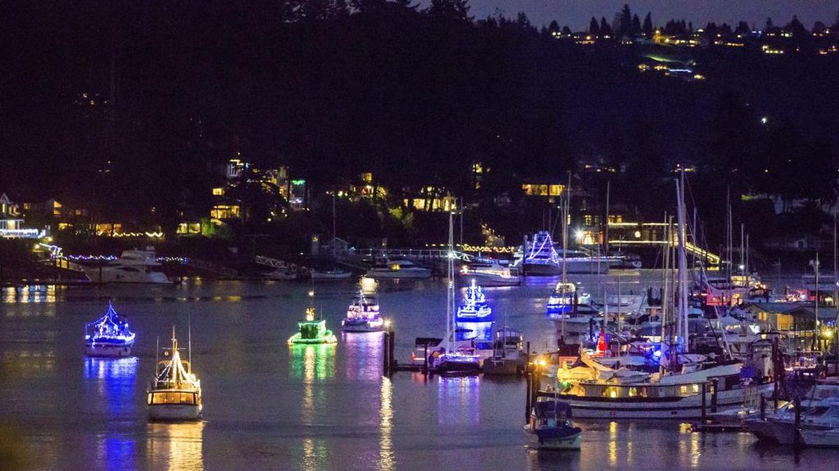 Boats fill the harbor during the Gig Harbor Lighted Boat Parade in December 2016. About 25 boats participated in the parade.
