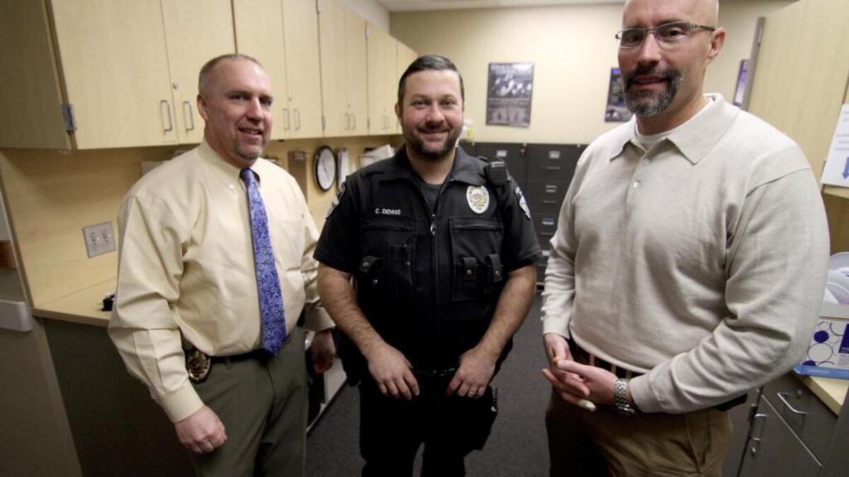 Gig Harbor Police Department Chief Kelly Busey, left, patrol officer Chet Dennis, center, and Lt. Fred Douglas are among the department members participating in a fundraiser for the Jaycox Police Benevolent Fund.