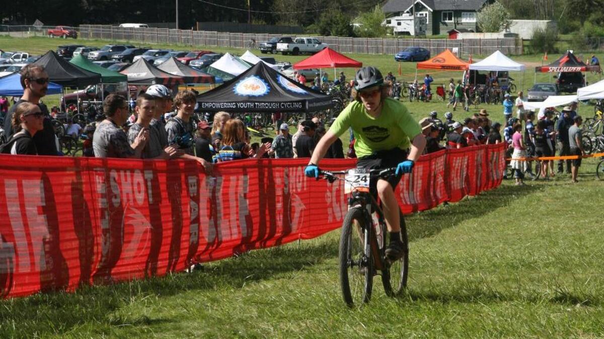 A few feet from crossing the finish line of the third annual Student Cycling League Race is hard-driving Alexander Walker of the Whatcom Composite Team. Key Peninsula’s 360 Trail Park hosted the race on Sunday.