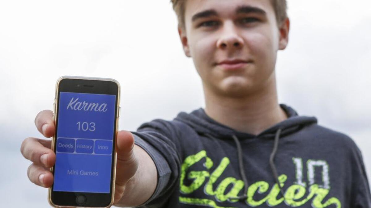 Gig Harbor High School junior Seth Daetwiler, 16, created a positivity app for the GHHS STEM club competition. The app is called Karma.
