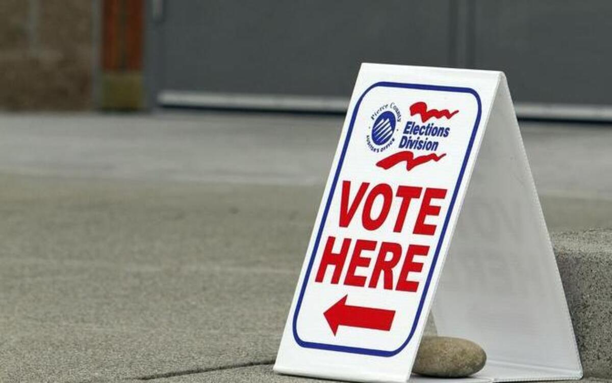 Sandwich boards mark the location to the Gig Harbor Civic Center-based polls during the 2014 primary election.