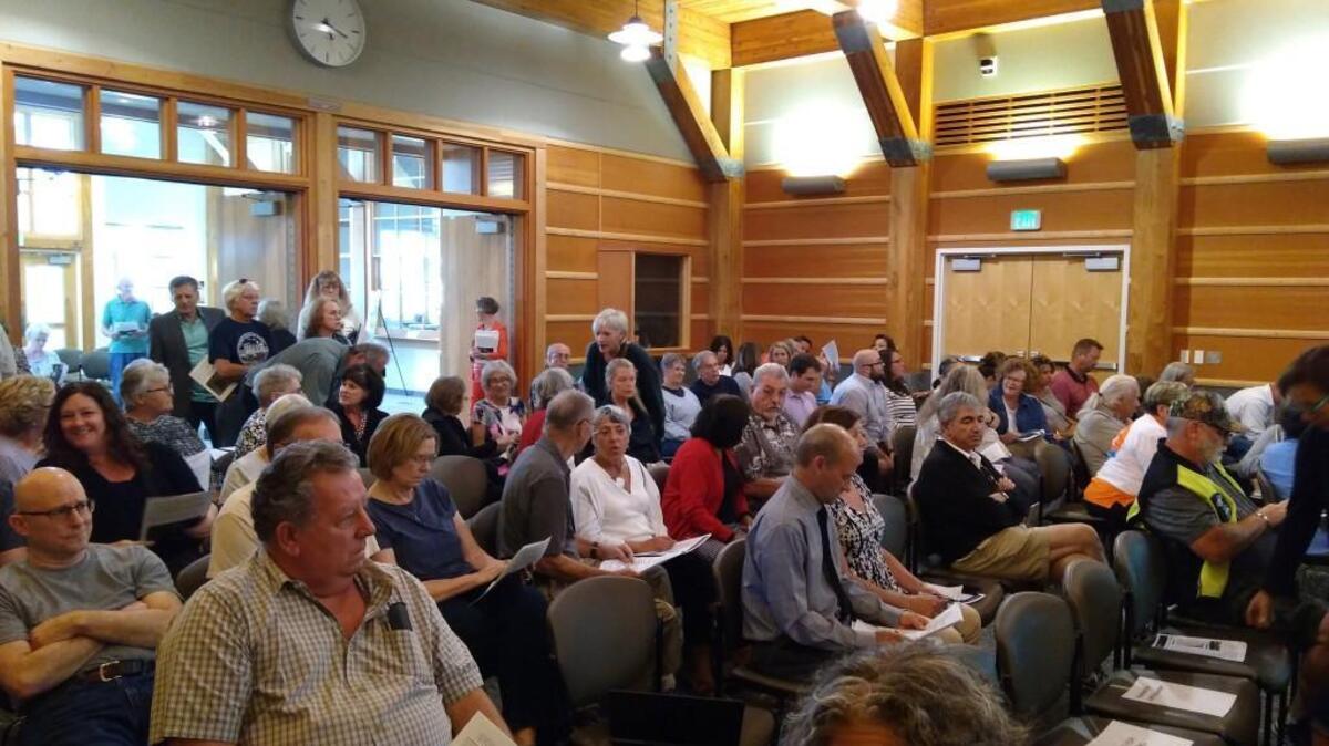 Concerned Gig Harbor residents pack the City Council Chambers during Monday night’s public hearing on the One Harbor Point development.