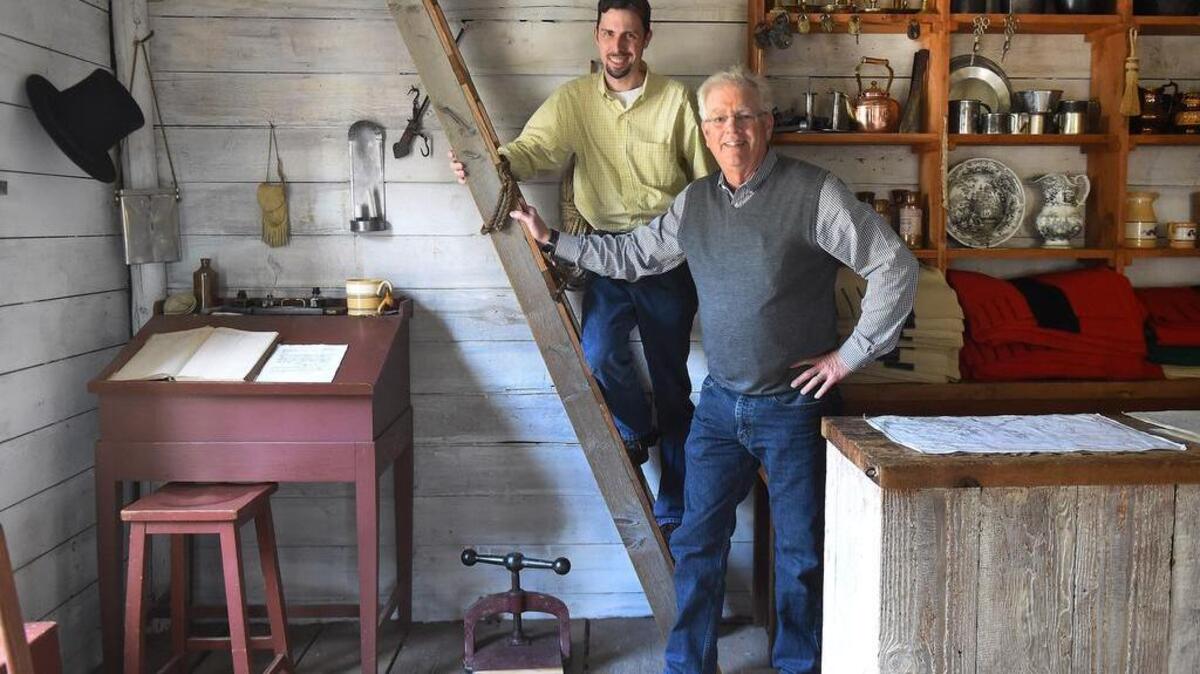Posing in the “Sale House” of the Fort Nisqually Living History Museum, David Jepsen, right, and David Norberg co-authored a book on Pacific Northwest history in which the fort is mentioned frequently as being vital to the fur trade and local pioneer life in the 1850s. Jepsen is a history professor at Tacoma Community College and Norberg is a Green River Community College professor.