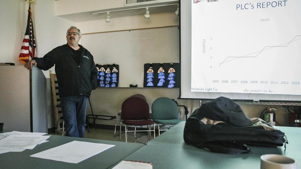 Peninsula Light Backup Power specialist Jonathan White briefs members of the Peninsula Emergency Preparedness Coalition on what to anticipate during “The Big One” at the group’s board meeting at Gig Harbor Fire Headquarters earlier this month.