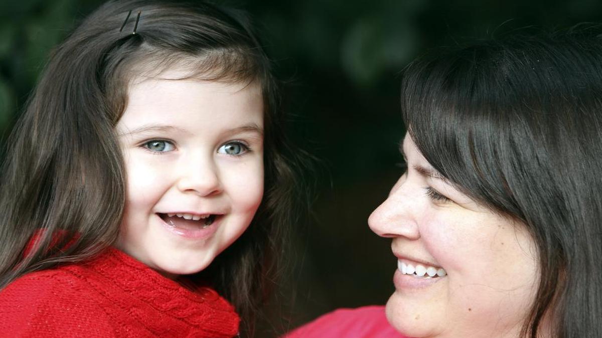 Violet Brielle, 4, and her mother, Shenay, share a lighthearted moment at their Gig Harbor home. Violet was diagnosed with Retinoblastoma, and through treatments she has recently been in remission and symptom free.