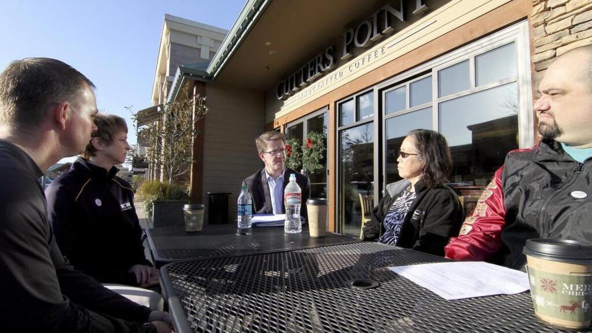 U.S. Rep. Derek Kilmer spoke with Haggen employees on Monday afternoon (Dec. 14) at the Gig Harbor Cutters Point coffee shop in the Uptown Shopping Center.
