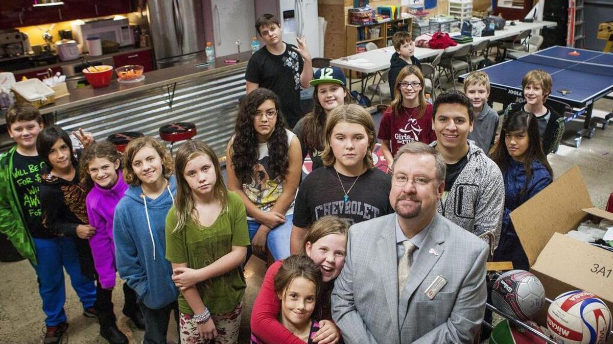 Clint Rosson, bottom right, recently took over as executive director for the Red Barn Youth Center on the Key Peninsula.