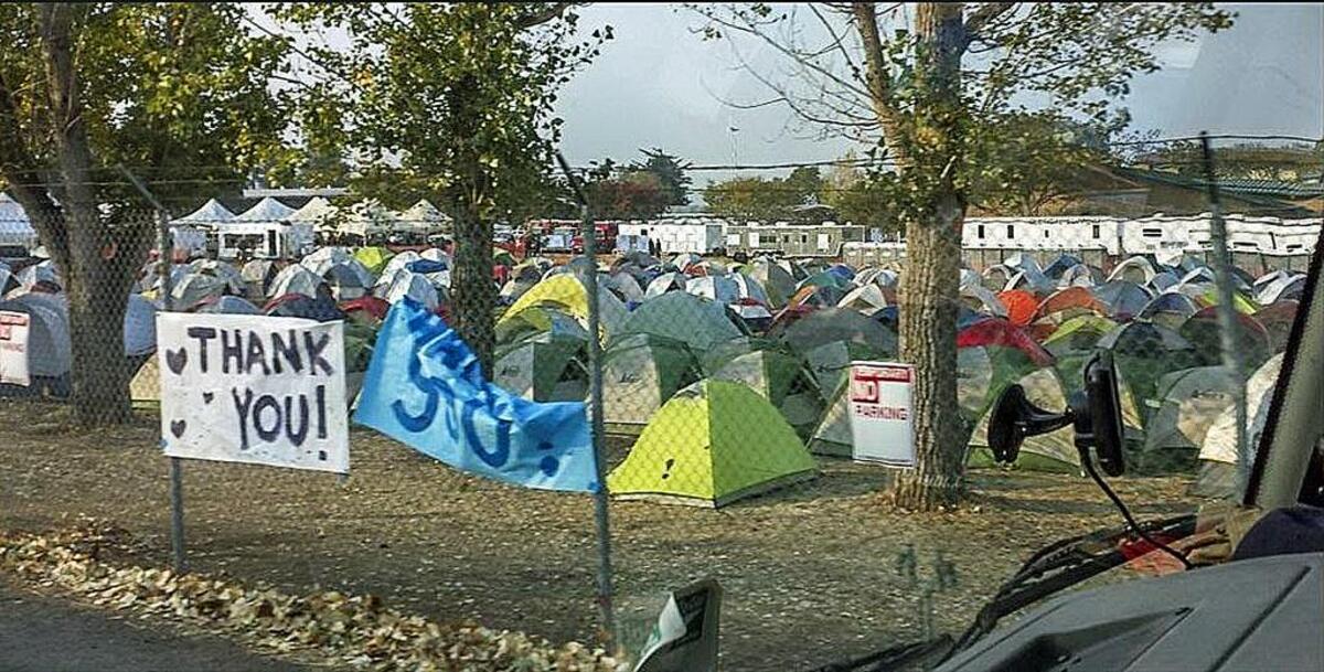 Signs of appreciation for the first responders made by locals adorn the main fire camp at the Santa Rosa Fairgrounds.