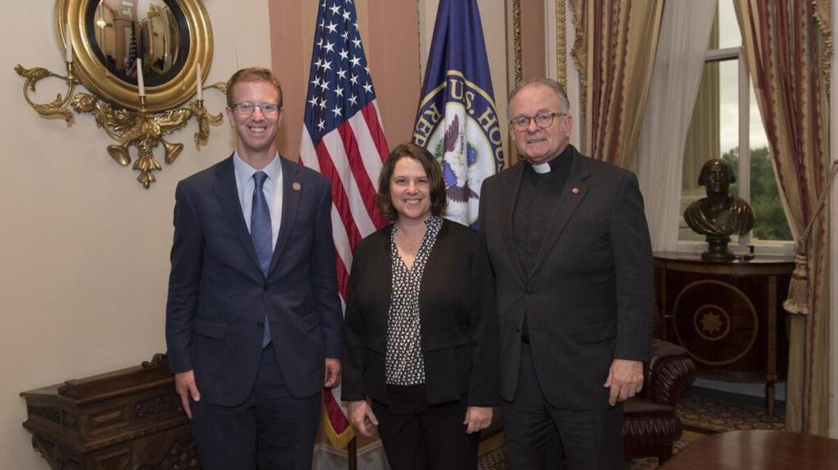 Reverend Molly Fraser of Gig Harbor United Methodist Church offered a prayer to the U.S. House of Representatives in Washington D.C. on Oct. 11. She is flanked by U.S. Rep. Derek Kilmer, left, and Rev. Patrick Conroy, a Jesuit priest who is serving as the 60th Chaplain of the House of Representatives.