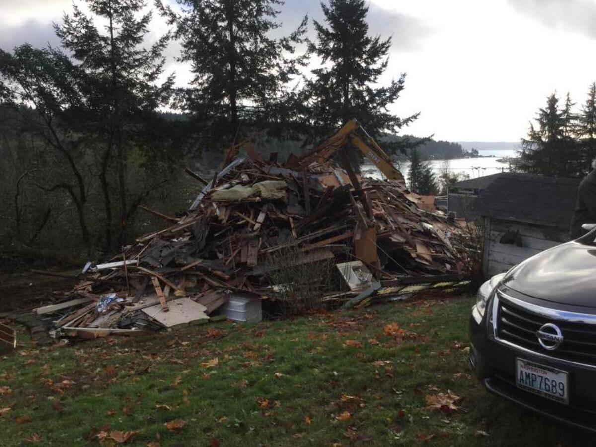 One of Gig Harbor’s oldest homes was demolished Monday after 100 years of serving as a residence to a local family. The home, located at 9204 Peacock Hill, was built in 1890 and housed two families for decades.