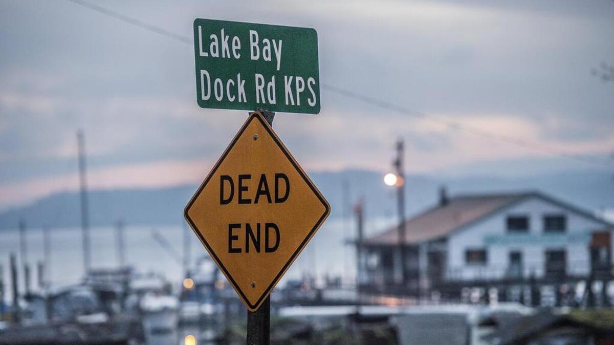 A Pierce County Council resolution will take the “KPN” and “KPS” designations on street addresses out like on this sign by the Lakebay Marina. Pierce County plans to adopt the new address protocols for about 17,000 properties in order to comply with 911 standards.