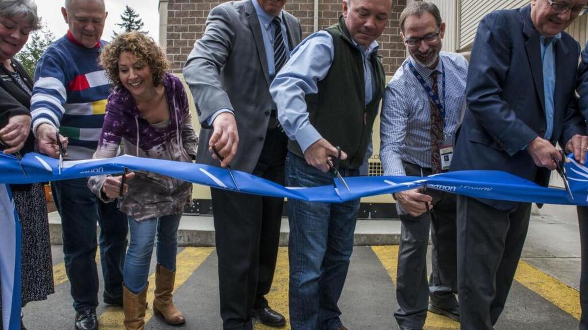 Community members celebrate the installation of a new emergency electric generator at Chapel Hill Presbyterian Church during a ribbon-cutting ceremony April 17 at the church.